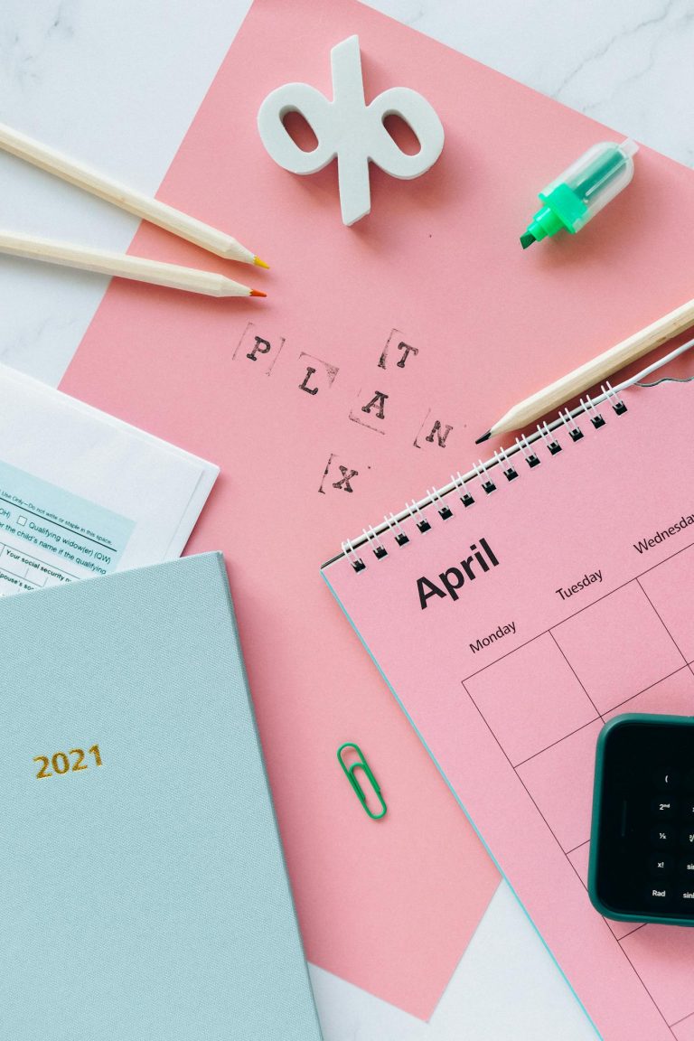 Tax Return Form and Notebooks on the Table